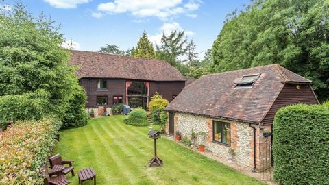 On the ground floor the accommodation comprises a large sitting room with a vaulted & beamed ceiling, a feature fireplace, patio doors to the garden and oak pillars surrounding the dining room with a tiled floor. The kitchen/breakfast room was added ...