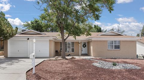 Welcome to your potential new home in the heart of Albuquerque! This house is a breath of fresh air, combining modern elegance with comfort. As you step inside, you'll be greeted by an abundance of natural light streaming through the windows, creatin...