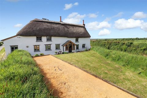 With no onward chain Gorrans Down is a three/ four-bedroom Grade II listed Devonshire thatched cottage dating back to the early 17th Century which sits in glorious rural countryside just outside the picturesque village of Hartland. Constructed out of...