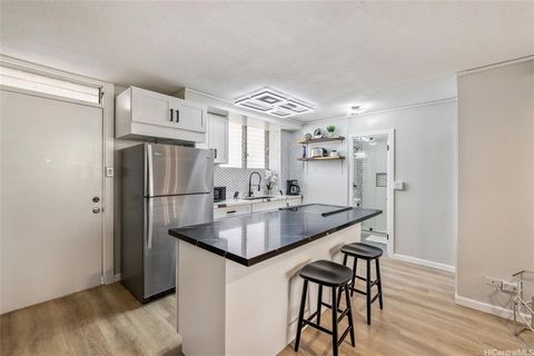 SELLER OFFERING $10,000.00 CREDIT TO BUYER TO ASSIST WITH CLOSING COSTS OR TO BUY DOWN THEIR INTEREST RATE! THIS STUNNING FULLY REMODELED 2 BEDROOM, 1 BATHROOM UNIT IS IDEALLY LOCATED TO WAIKIKI BEACH, RESTAURANTS, AND SHOPPING CENTERS! WHETHER YOU A...