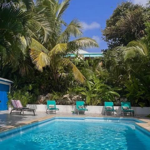 Discover this magnificent charming Creole villa, ideally located a few steps from the beach accessible on foot. Swimming pool with its large beach to enjoy a moment of relaxation lying on its deckchair. American Kitchen: Enjoy a modern and functional...