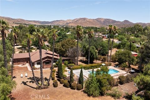 Spanning over 2.35 acres spread across two lots (2 APN's) for the price of one. Welcome to this amazing private estate offering unparalleled seclusion and space. This home exudes timeless charm while featuring modern comforts. Enjoy serene mountain a...