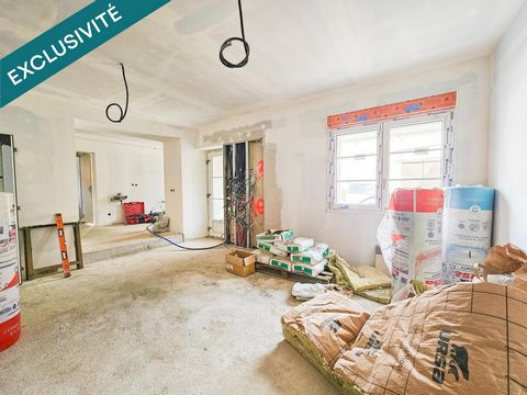 App T3 en état brut avec jardinet de 70 m² et cave