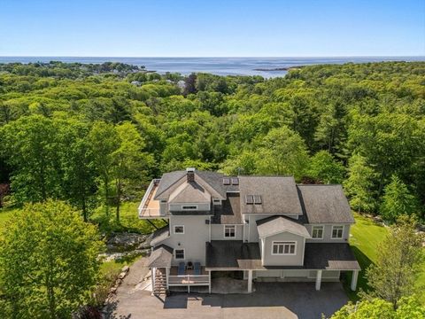 Privacy abounds in this one-of-a-kind breath-taking hilltop contemporary sited on 16+ acres that boasts captivating ocean views and lush rolling lawns. An open floor plan integrates the spacious eat-in kitchen, formal dining area, and cozy family roo...