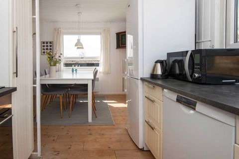Holiday cottage close to the North Sea at Henne Strand surrounded by heather-clad dunes and vast moorland. The house has just the right summer mood needed. Quality and space signifies the house that has bedrooms, bathroom with shower and a kitchen lo...