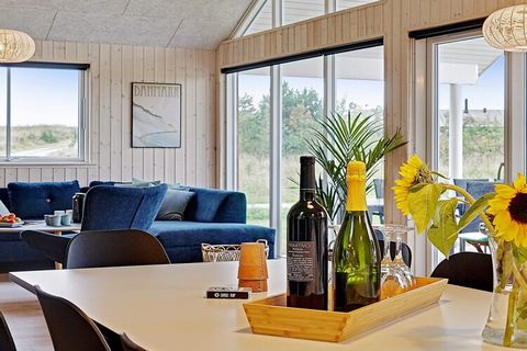 This well-appointed holiday cottage with swimming pool, whirlpool and sauna as well as various activities is located approx. 1200 m from the ocean at Fjellerup Strand. The pool area has a large swimming pool with water slide, counter-current system, ...