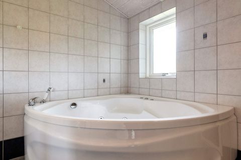 A holiday home with whirlpool and sauna in the bathroom. Close to Øster Hurup's fine beach and with walking distance to the town. The house has a large living room combined with a dining and kitchen section, as well as an alcove. There is a swing in ...