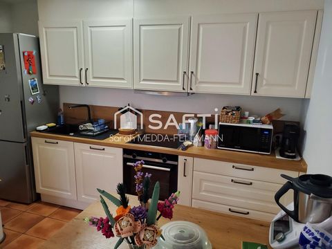 APPARTEMENT COMME UNE MAISON avec JARDIN et GARAGE