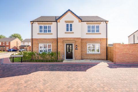 The property itself benefits from a commanding position and gives views to the front over the attractive green within this exclusive development. The living accommodation is set over two floors and briefly comprises of a beautifully fitted upgraded k...