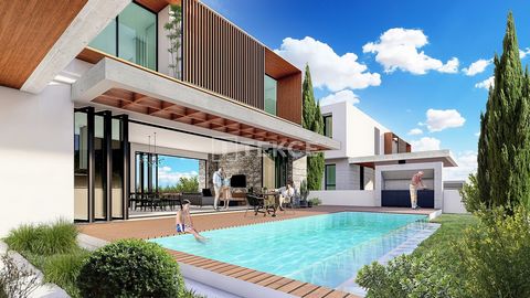 Villas Individuelles Avec Piscines Privées à Girne Ozanköy Les villas se trouvent à Ozanköy, un village de Girne situé au nord de Chypre. Elle est connue pour son histoire, son paysage entouré d'oliviers et son architecture traditionnelle. La zone es...