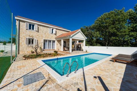 Location: Zadarska županija, Nin, Zaton. ZADAR, ZATON - Luxury stone villa with swimming pool Beautiful stone villa with swimming pool for sale in Zaton near Zadar. The villa was built in 2022 on a plot of 464 m2. It consists of ground and first floo...