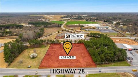 This expansive 4.53-acre parcel, boasting an impressive 500 feet of frontage on Hwy 28, directly in front of Tri-County Technical College in Anderson, SC offering a versatile canvas for multi-use development. Whether you envision multifamily residenc...