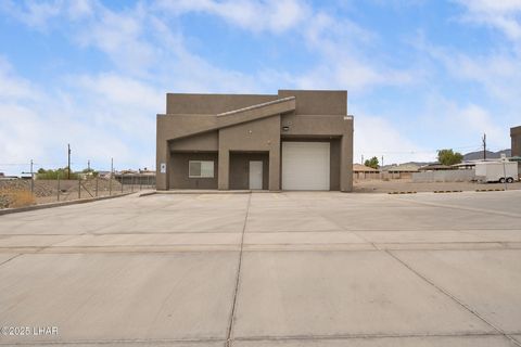 Opportunity to own a commercial building built in 2019 with 3,614 of warehouse space with a 314 sq.ft. office and 2 bathrooms. The building is 90' deep with a 12' tall front garage door and a 13.8' tall rear garage door. The warehouse is air conditio...