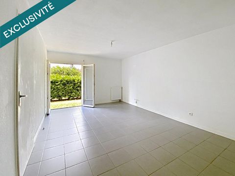 T2 en rez de jardin avec place de parking couverte