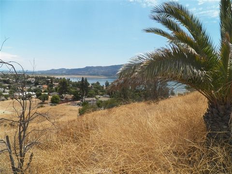 Undeveloped lot with views overlooking the Lake and the city of Lake Elsinore. Lot must be sold together with adjacent lot (see MLS#IG23174937 and APN#375-371-014 for adjacent lot details, pricing, and terms). These lots are located at the coroner of...