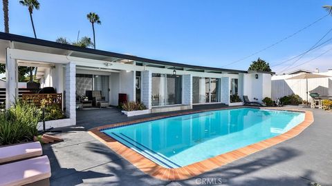 It’s summer time!! Make this beautifully remodeled and corner lot POOL HOME yours!! This single-story 3 bedroom 3 bathroom plus sunroom offers over 2,000 sf of living space. Enter through a custom iron gate and immediately you feel the private entry ...