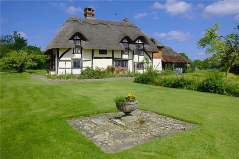 Dormers is a wonderful Grade II listed family home set within fabulous grounds of about six acres in a glorious semi rural village location. The earliest part of the property dates back to the early fifteenth century with later additions around 1900....