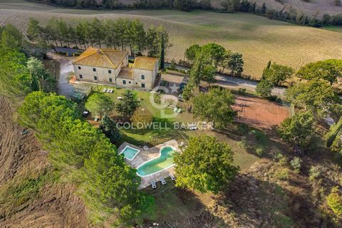 Charming, well-preserved farmhouse in the green hills of the Tuscan countryside. The farmhouse dating back to the early 1900s, completely renovated with local materials, maintaining the typical architectural features of the farm era. With its 7 apart...