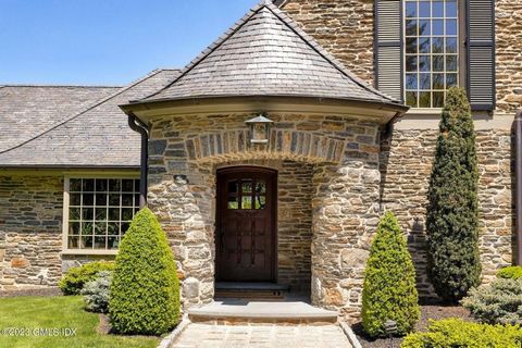 Exquisite stone and clapboard 1940 home, has been meticulously restored using the finest materials. Every aspect of the house and 2 guest cottages has been taken to the studs and renovated by current owners. Dramatic stone Living rm with over-sized w...