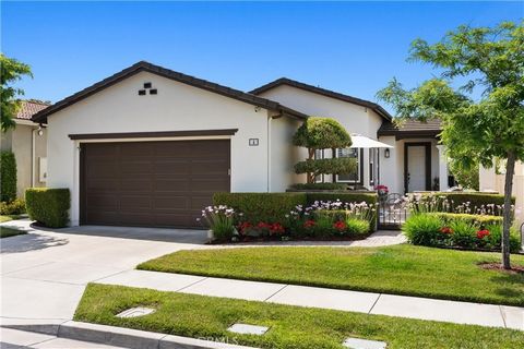Welcome to an exquisite single-level home in the highly sought-after 55+ Talega Gallery community, nestled on a peaceful and quiet cul-de-sac with an incredible view. This home has been beautifully designe'd and has a contemporary beach ambience. Thi...