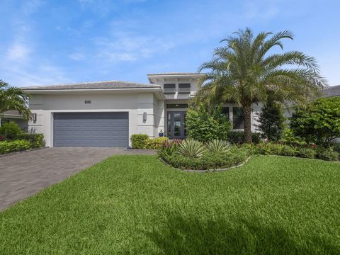 Experience elegant living in this contemporary spec home, nestled within the prestigious 55+ community of Cresswind Palm Beach. Crafted by Kolter Homes in 2022, this residence offers lake views and an expanded primary bedroom for added comfort. The i...