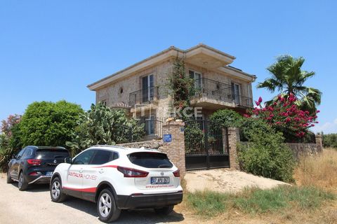 Partially Furnished Stone Villa Close to the Airport in Antalya Aksu The villa for sale is located in Ermenek, a villa region of Antalya. The region continues to gain value due to its location close to the airport and Lara Beach, and being a quiet an...