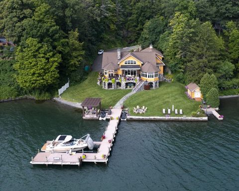 Discover the best investment opportunity in the idyllic Finger Lakes Wine Country with this stunning year-round lake house, perfectly situated on the picturesque shores of Cayuga Lake. Just 4 hours from Manhattan and close to Ithaca Tompkins Internat...