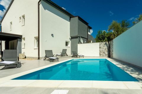 Rare and hot! Semi-detached villetta with with swimming pool for sale just 100 meters from the sea in Soline Bay on Krk. Total area is 110 sq.m. Land plot is 110 sq.m. It consists of ground floor and first floor, interconnected by an internal stairca...