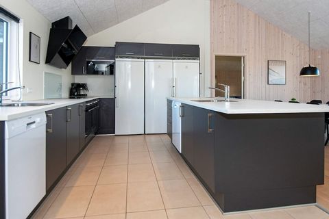 Large, well-appointed cottage by Houstrup Strand with lots of exciting details and activity opportunities. The pool area has a large swimming pool, water slide, large built-in whirlpool and sauna. The swimming pool is 18 m & # 178; and with slide for...