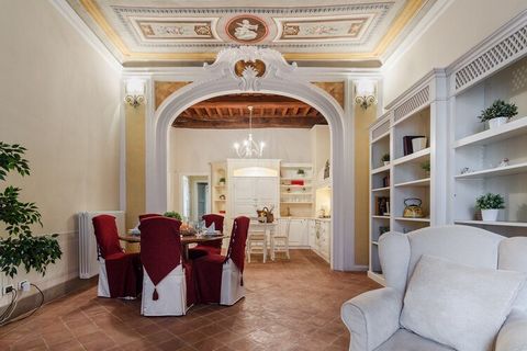 Step into a beautifully renovated apartment that embodies the charm and history of Lucca. Just steps away from the stunning Cathedral of San Martino and around the corner from the iconic Guinigi Tower, this bright and inviting retreat serves as an id...