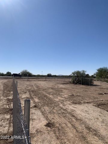 Commercial fenced lot in booming Pinal County on busy Highway 84. Great opportunity for investment in growing area. Water and electric to the property. Minutes from I-10 and railroad. Priced to sell!!