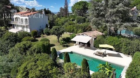 Close to CANNES and directly bordering the town of MOUGINS. Magnificent property in a dominant position with a sea view, located in a privileged and residential area close to all amenities. The fully renovated villa, with high-end features and high-q...
