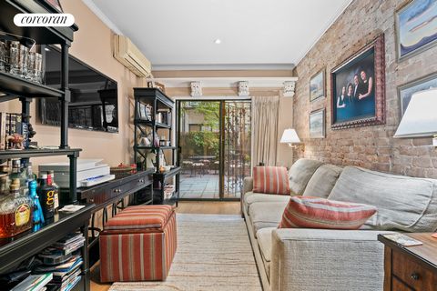 Nestled within a charming 19th-century townhouse on a picturesque block by Riverside Park, this duplex garden apartment offers an abundance of indoor and outdoor living space in a prime Upper West Side location. Enter through a private vestibule with...