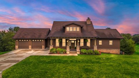 Discover a one-of-a-kind cedar home nestled on just over 3 acres in the sought-after Crown Point School District, where luxury meets nature. This expansive 6-bedroom, 5-bathroom residence offers unparalleled comfort with en suite living. The main flo...