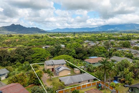 Nestled in Waialeale Estates, this extraordinary property offers breathtaking ocean views and panoramas of four majestic mountain ranges, including Sleeping Giant and Mt. Waialeale. The main house features four spacious bedrooms and three full bathro...