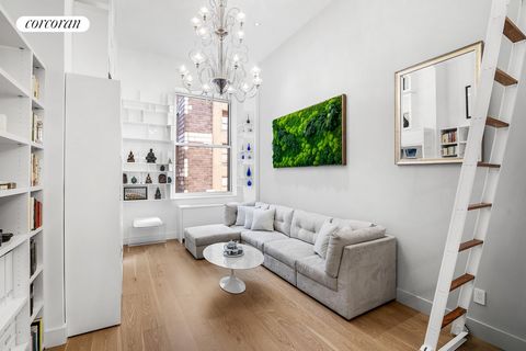 GUT RENOVATED - SEPARATE SLEEPING LOFT - EXCEPTIONALLY HIGH CEILINGS - BRAND NEW FLOORS - HIGH END APPLIANCES - HUGE DRESSING AREA W/ SEPARATE CLOSET - MASSIVE STORAGE Nestled amidst the bustling heart of Manhattan's Financial District, this exquisit...