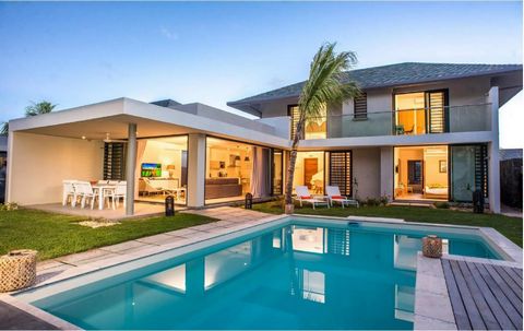 This luxury villa invites you to enjoy an exceptional lifestyle on the west coast of our island. Ideally located just 800 metres from the lagoon and surrounded by the majestic Tourelle mountain, it offers breathtaking views and easy access to all the...