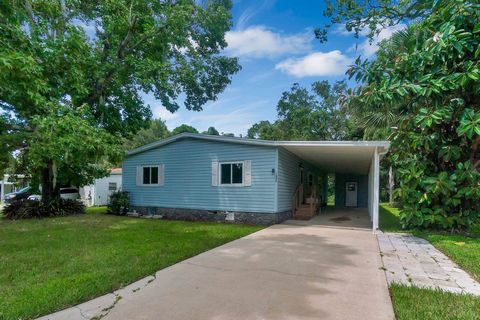 This charming double wide, quietly tucked away in a peaceful neighborhood found in the heart of Winter Springs, can be your next home! Built high-and-dry this home features an over sized car port with a shed and a private screened in porch. New roof,...