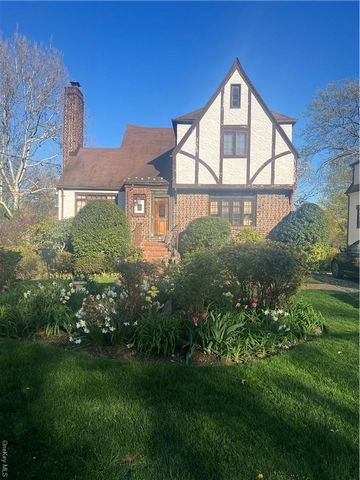 Introducing this lovely four bedroom two bath Tudor located in the Murray Avenue School district. Entry vestibule leads you into large living room with beamed ceilings and wood burning fireplace, formal dining room and doors to office/den, open updat...