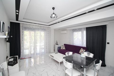 ALANYA/CENTER   100 METERS FROM THE SEA CLOSE TO EVERYWHERE DUE TO ITS LOCATION 2+1 FURNISHED 100 M2 1ST FLOOR AMERICAN KITCHEN WEST - FACADE ELEVATOR POOL FITNESS SAUNA BATH JACUZZI AND BARBECUE AREA ON THE ROOF   Features: - Alarm - Garden - Sauna ...