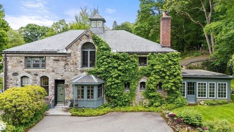 Discover timeless elegance and modern luxury in a beautifully reimagined 1890 stone carriage house in Newton Centre. The distinctive residence showcases generous room sizes, abundant natural light, and old-world charm throughout. This home offers 4 b...