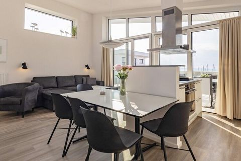 This penthouse apartment on the waterfront at Marina Wendtorf offers a stunning rooftop terrace with magnificent panoramic views of the sea and the small marina. Both the living room and terrace provide breathtaking vistas, perfect for enjoying the c...