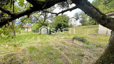Terrain constructible arboré, calme et potentiel.
