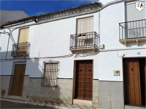 This lovely 3 bedroom townhouse is centrally located in the pretty town of Gilena which sits in the province of Seville, just a short drive from from historical Estepa. The property has a typical Andalucian tiled entrance hall which leads to a centra...