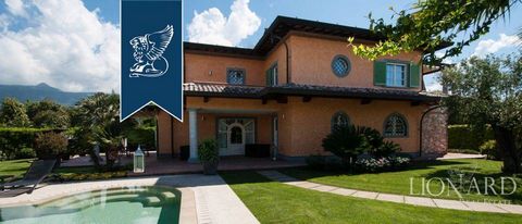Near the prestigious Vittoria Apuana, stands this luxury villa for sale, in Forte dei Marmi. The property was recently reconstructed and is equipped with all the comforts of a high-level estate. You enter the property along a path that crosses the lu...