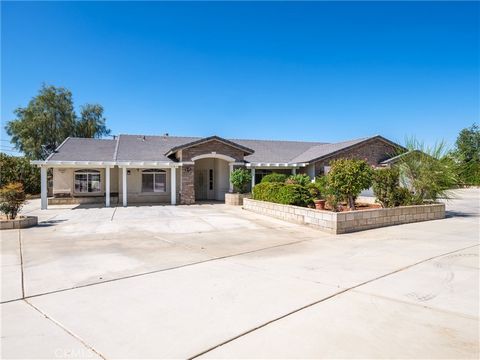 Welcome to your ideal residence in the heart of Apple Valley! 2 units!! The main house features 4 bedrooms 3.5 bathrooms and the pool house/studio features 1 room and 1 bath. This meticulously crafted custom home is brimming with an array of features...