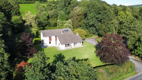 Nestled within the breathtaking landscapes of mid Wales, this charming property encompasses two distinct dwellings set amidst approximately 13 acres of meticulously landscaped gardens, grounds, and scenic amenity woodland. Ideal for multi-generationa...