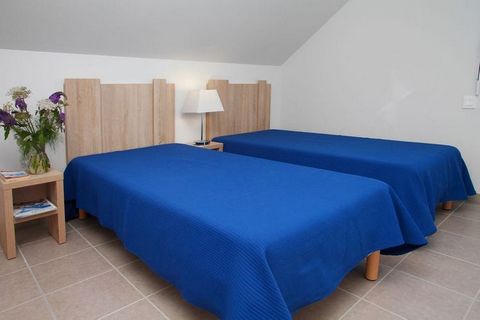 The small-scale holiday park Les Iles du Morbihan is the ideal location for a successful holiday in beautiful southern Bretagne. It's built in modern, local style and consists of about eight buildings with two floors and different apartments. Each ap...