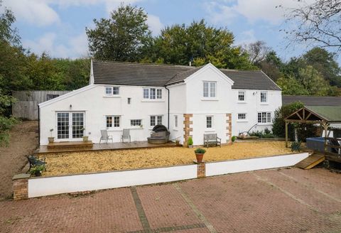 Nestled within a stunning rural setting, this historic home effortlessly combines over 500 years of history with a recent, high-end renovation to create a gorgeous dream country home. Hidden off a small, quiet country lane at the end of a long, meand...