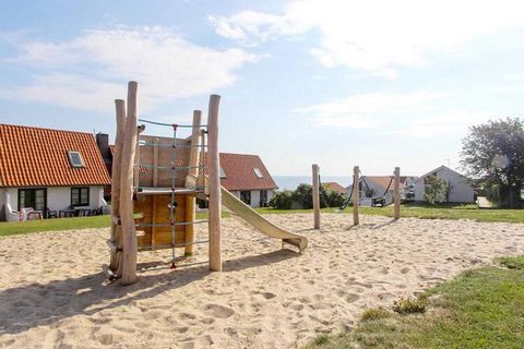 Parque de vacaciones Gudhjem & # 8212; vacaciones en la isla soleada Casas de vacaciones en estilo Bornholm a 10 minutos del puerto ya 5 minutos de la playa. El punto de partida de la familia para los viajes a Helligdomsklipperne, Paradisbakkerne, Ch...